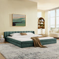 Stylish king size upholstered bed with chenille fabric in green, low-profile design with cozy headboard in modern bedroom setting.