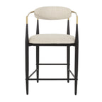 Single modern counter stool with beige seat and backrest, featuring sleek black iron legs and gold arm accents.
