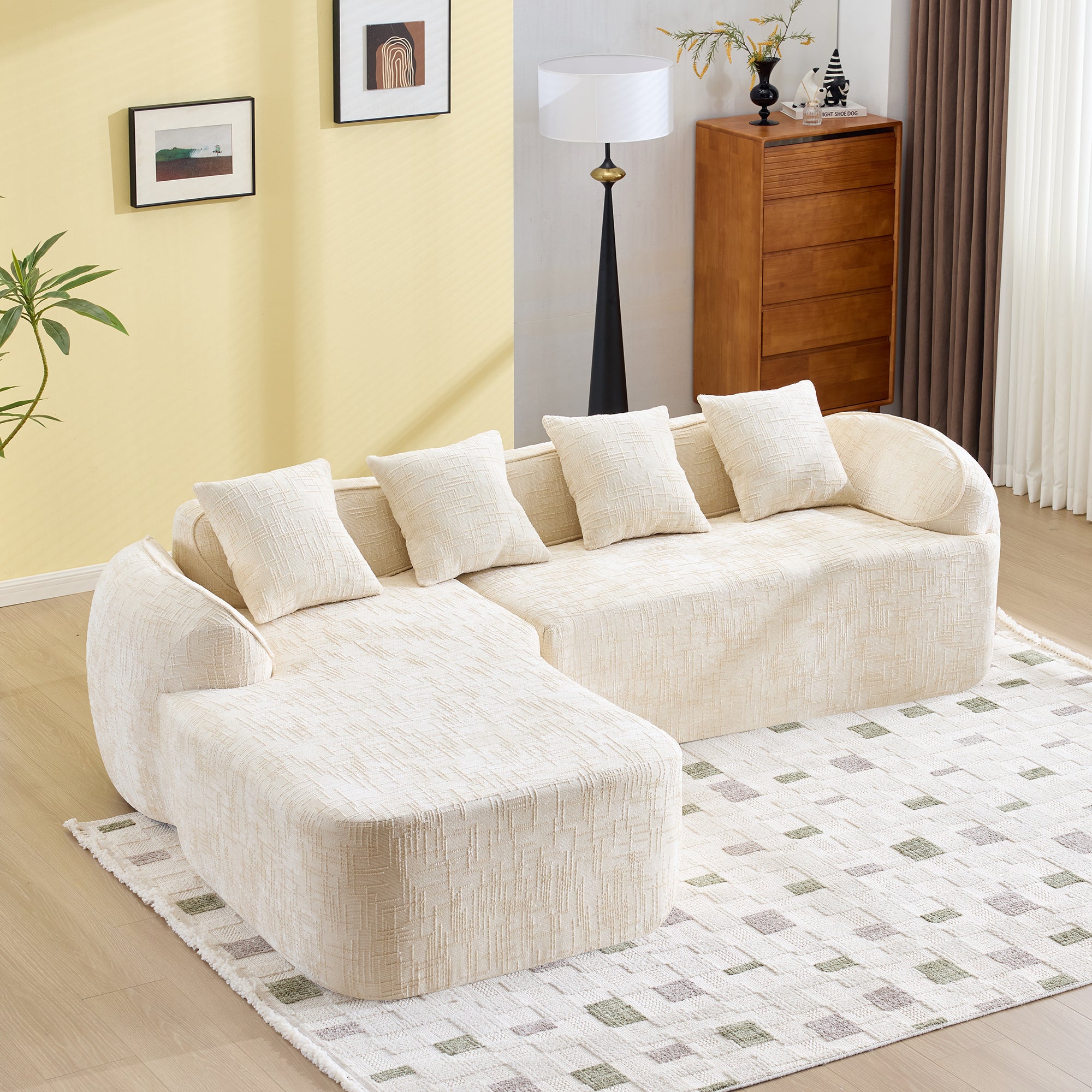 Comfortable L-shaped beige chenille sofa with five pillows, ideal for modern living rooms with soft sponge and spring support.