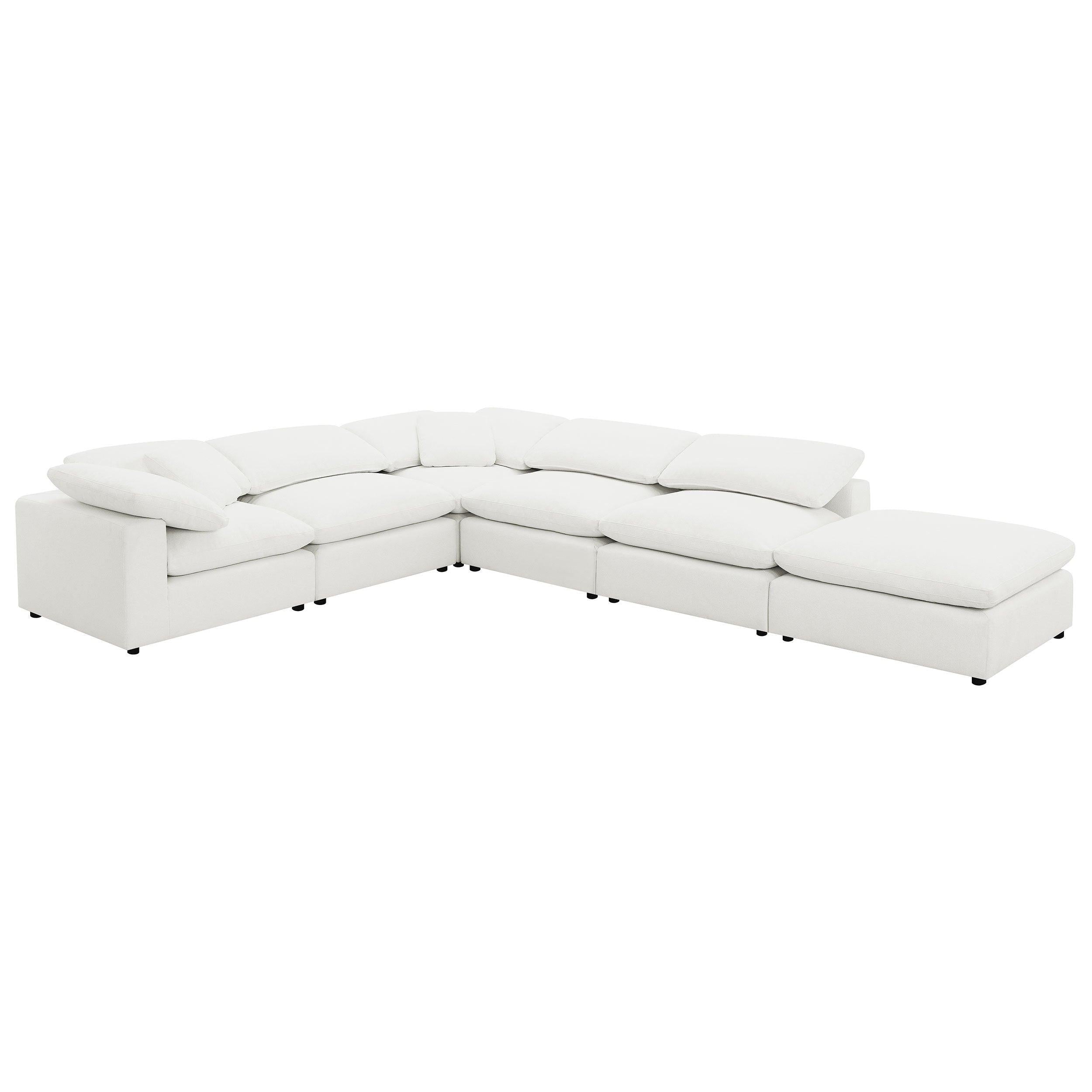 Segoura Ivory Upholstered Modular Sectional with Ottoman.