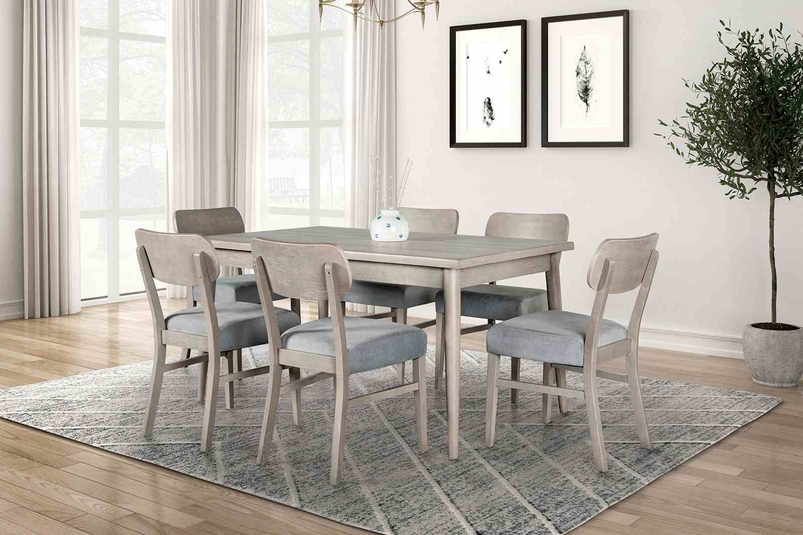 Dining room setup with six transitional gray dining chairs and matching table, ideal for contemporary interiors.