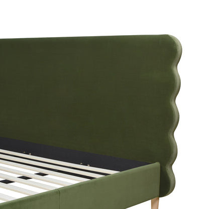 Close-up of Stockholm Modern king bed's olive green wavy headboard in performance velvet, showcasing elegant curves and sturdy frame.