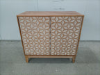 Geometric Sideboard Tangerine Walnut - 31.5" Storage Unit front view in warehouse setting, highlighting its bold geometric door design.