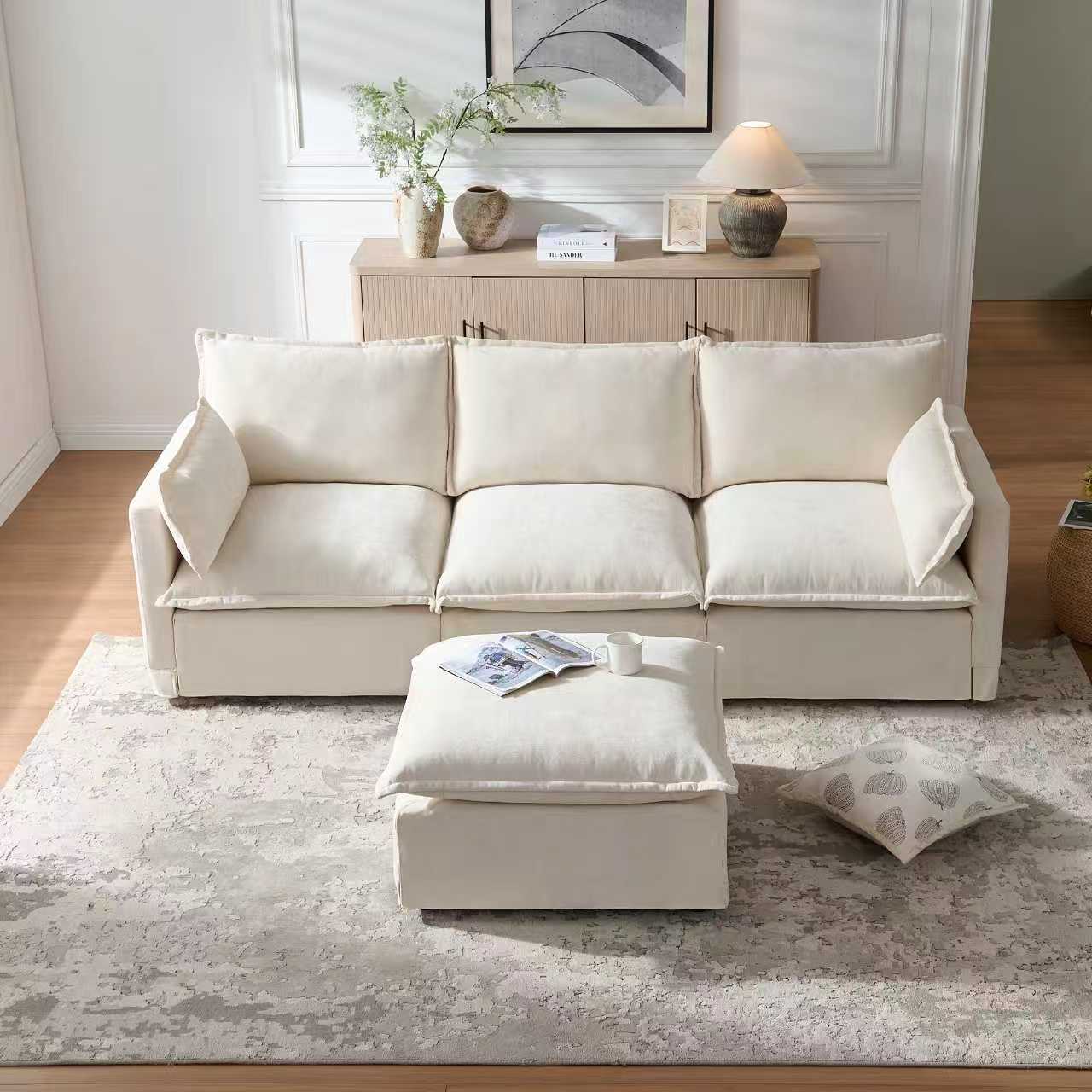 Modern Modular Sectional Sofa with Ottoman - 4-Seater in a front-facing view, styled in a cozy living room with a soft area rug and minimalist furniture.