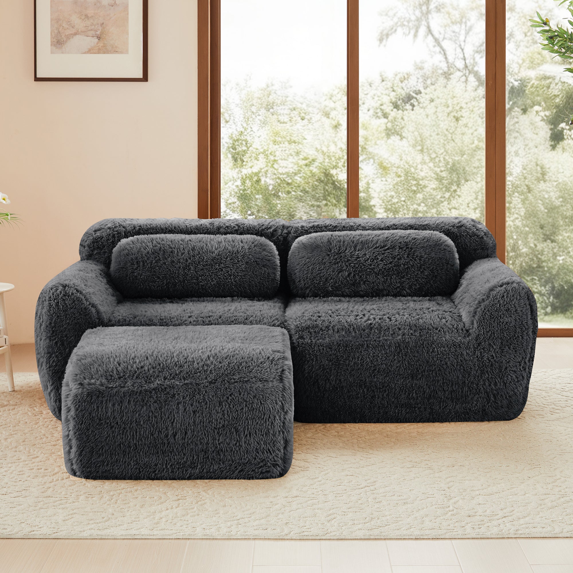 Dark grey modular plush L-shaped sectional sofa with chaise, ergonomic and soft, perfect for cozy and stylish interiors.