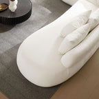 Top view of chaise section on Oversized L-Shape Sectional Sofa Beige, styled with throw pillows and modern decor.