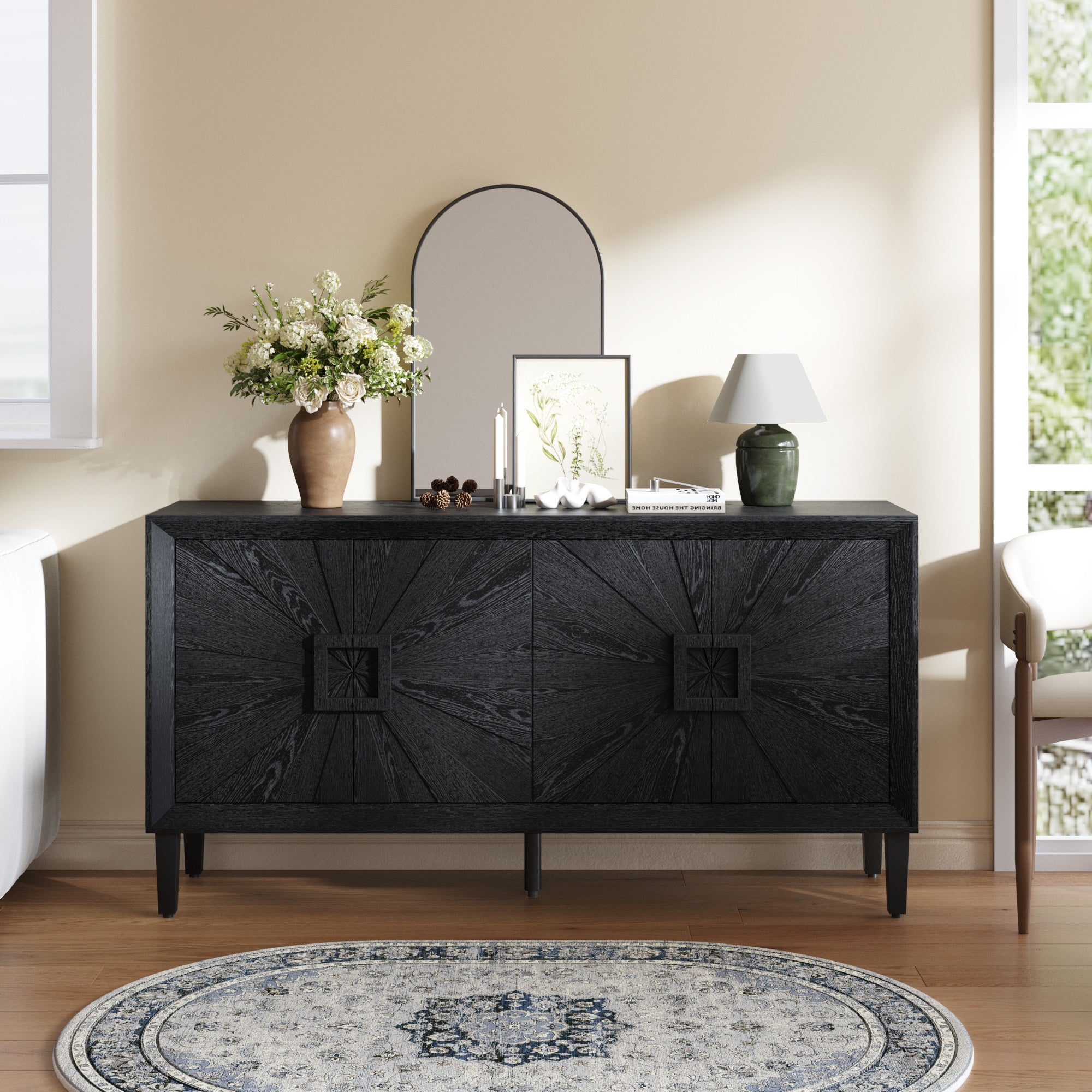 Black Farmhouse Credenza - Sunburst Door Design placed against beige wall, showcasing elegant storage for living or dining spaces.