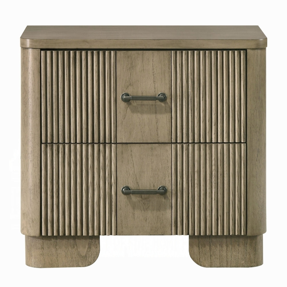 Front view of transitional nightstand with 2 drawers in antique oak. Features vertical grooves and metal handles for a rustic bedroom look.