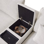 Storage console of L-Shaped sectional sofa shown open with headphones and magazines inside, highlighting its multi-functional storage design.