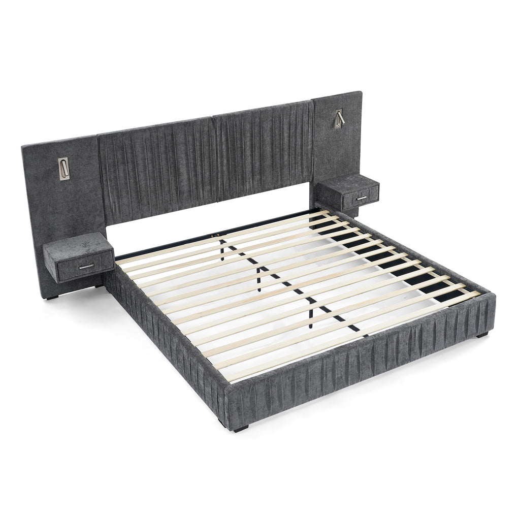 Queen upholstered bed with built-in bedside tables and adjustable lamps, featuring a solid frame and pleated headboard in dark gray fabric.