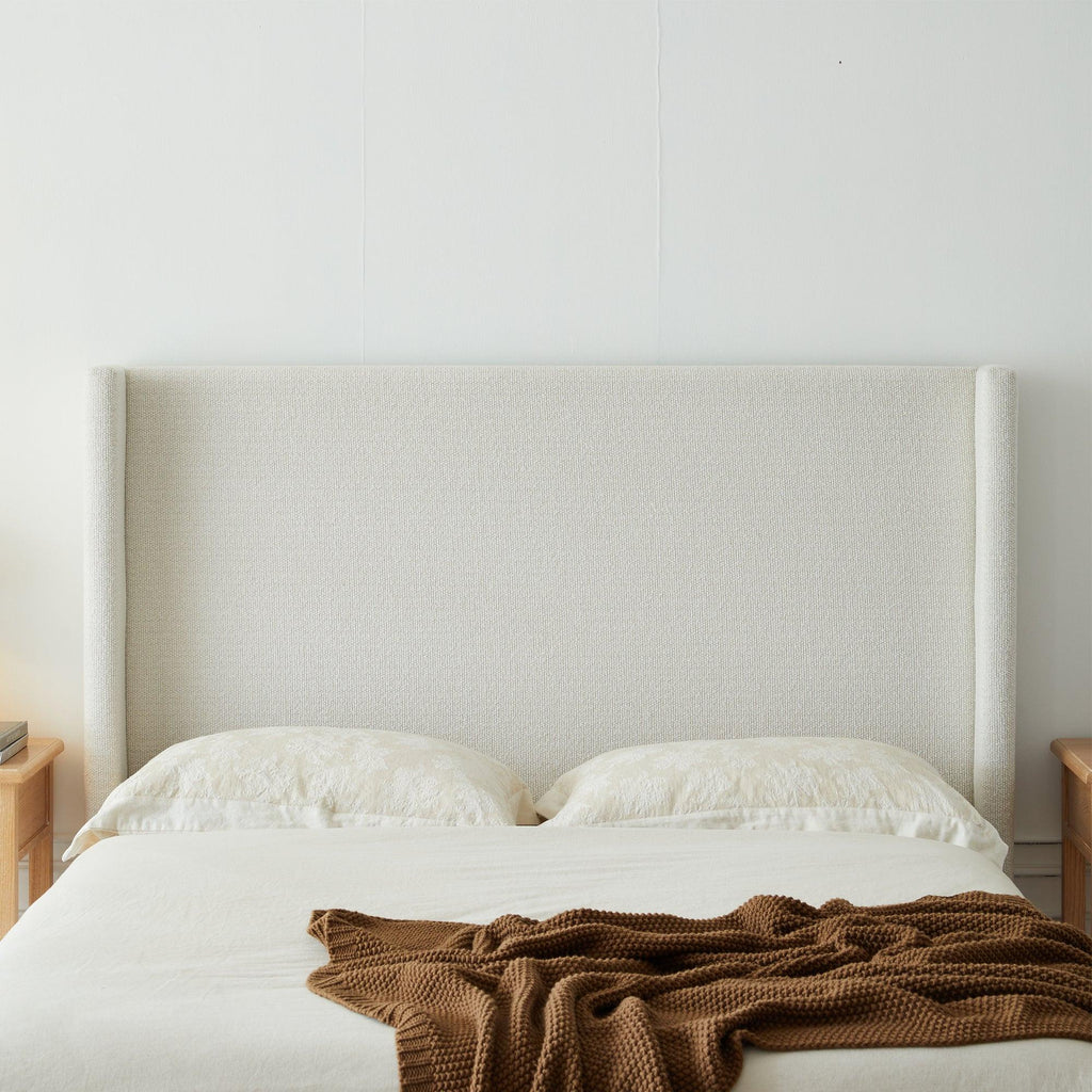 Hosford Minimalist Upholstered Wingback Bed - California King.