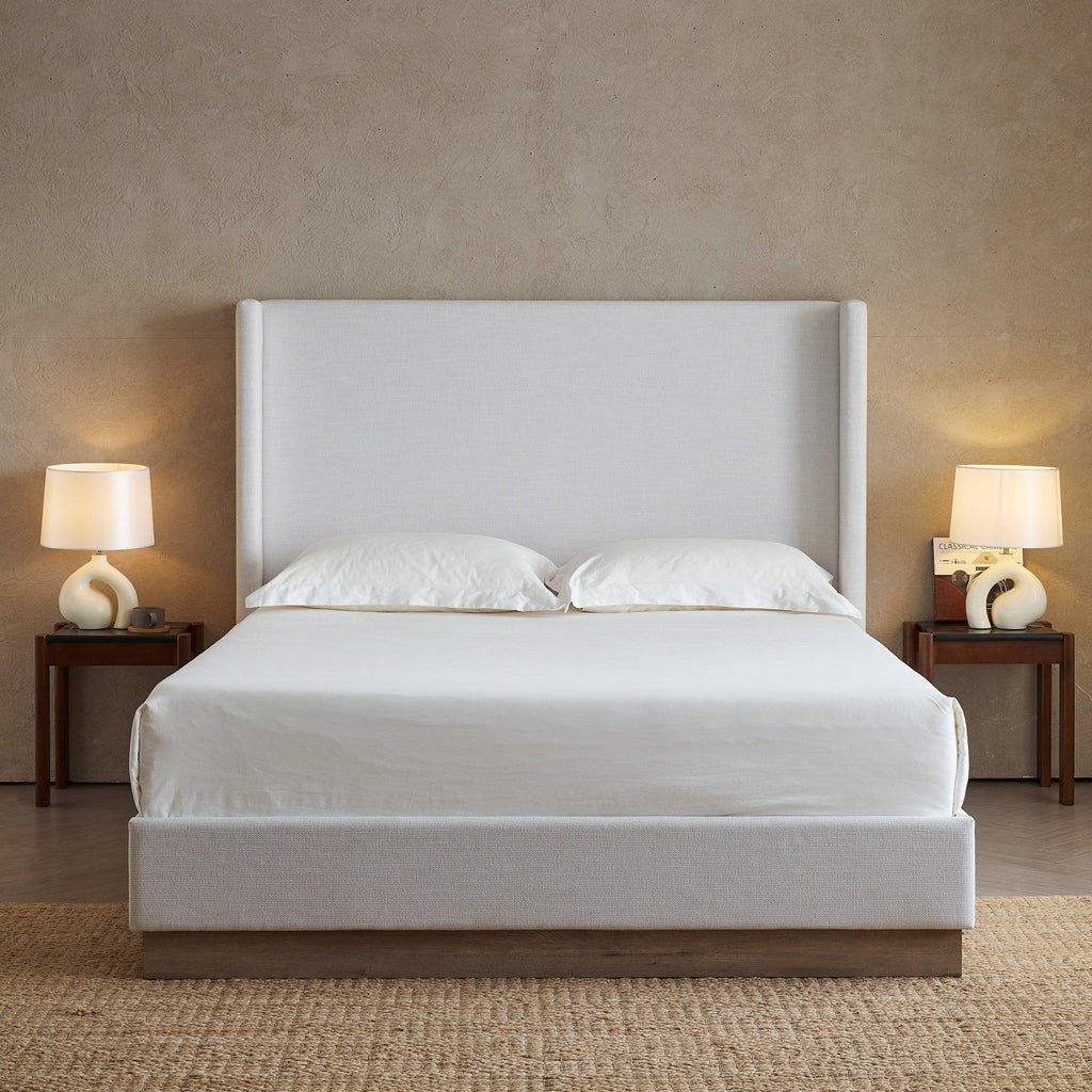 Hosford Minimalist Upholstered Wingback Bed.