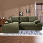 Green corduroy sofa with foam cushions and pillows, placed on a patterned rug. Durable and skin-friendly fabric for daily use.
