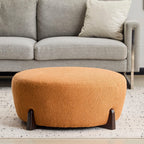 Round Boucle Ottoman with Rubber Wood Legs.