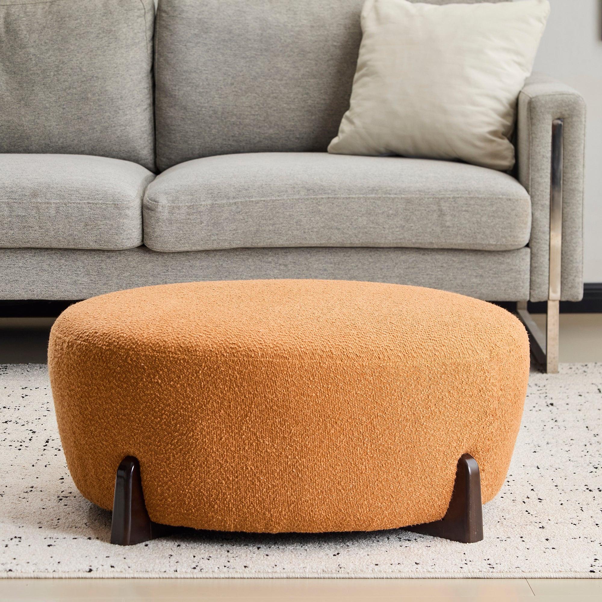 Round Boucle Ottoman with Rubber Wood Legs.