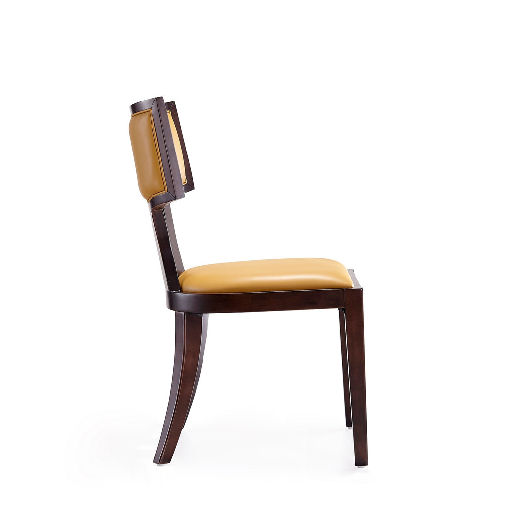 Side profile of camel wood dining chair with solid beech legs and camel faux leather seat, highlighting ergonomic backrest curve.