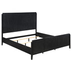 Modern Eastern king bed frame in black with a wire-brushed wood finish and vertical fluted detailing on head and foot.