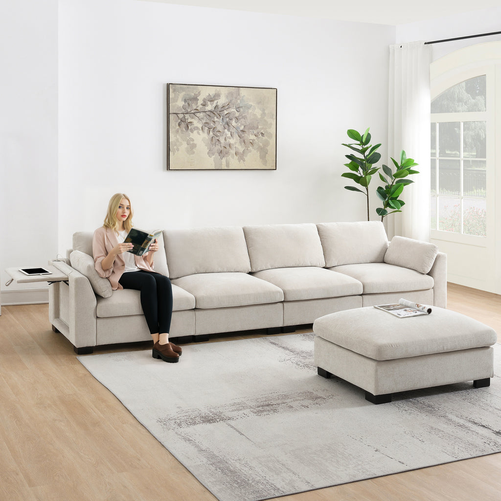 Modular sectional sofa with dual charging and storage in chenille fabric, shown in a bright living room with a woman reading on it.