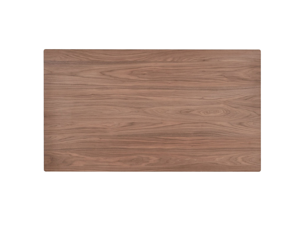 Top-down view of Sarha walnut dining table showing rectangular shape and wood grain texture.