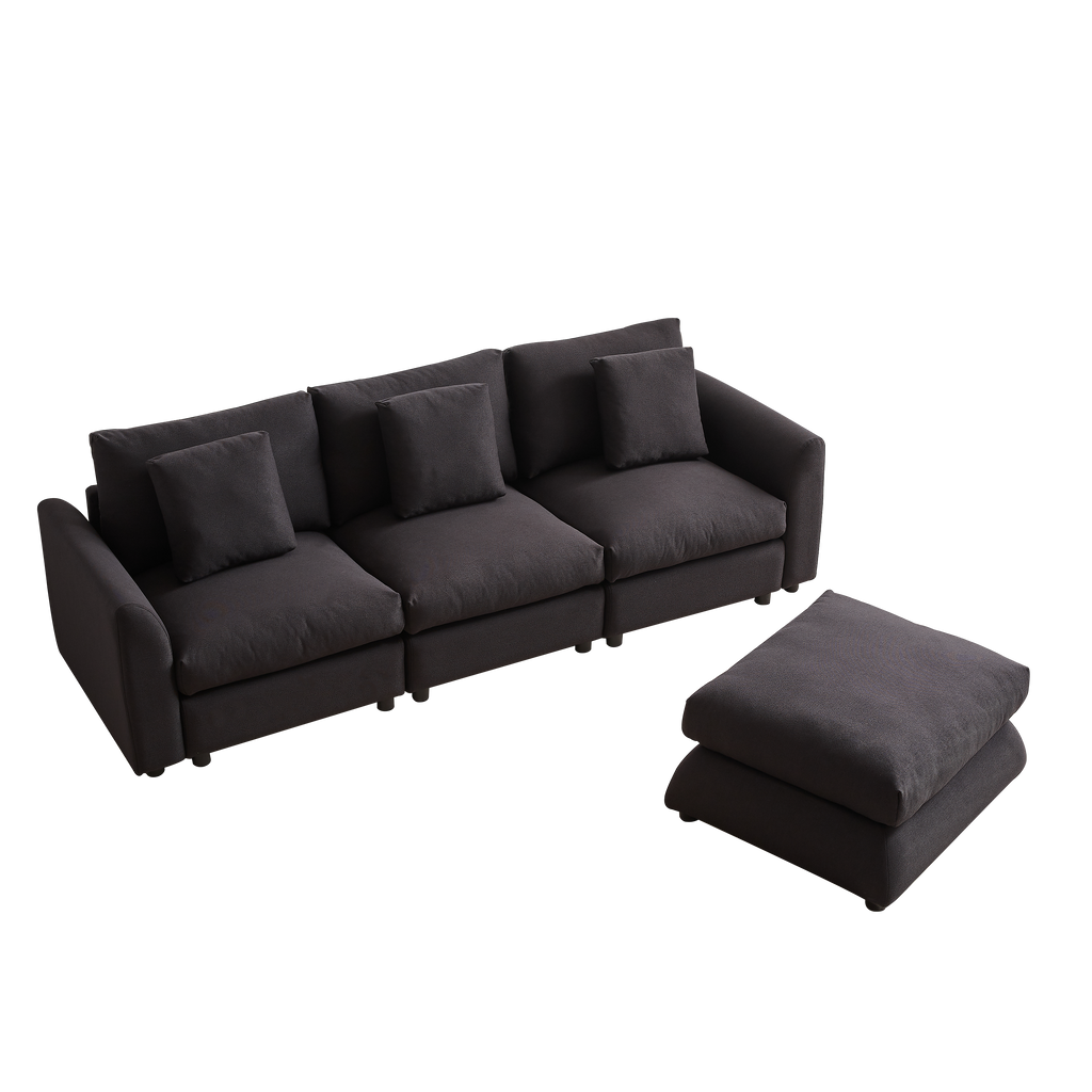 Dark modular sofa with separate ottoman, arranged in a customizable L-shape with 3 cushions and 4 pillows, ideal for flexible seating solutions.