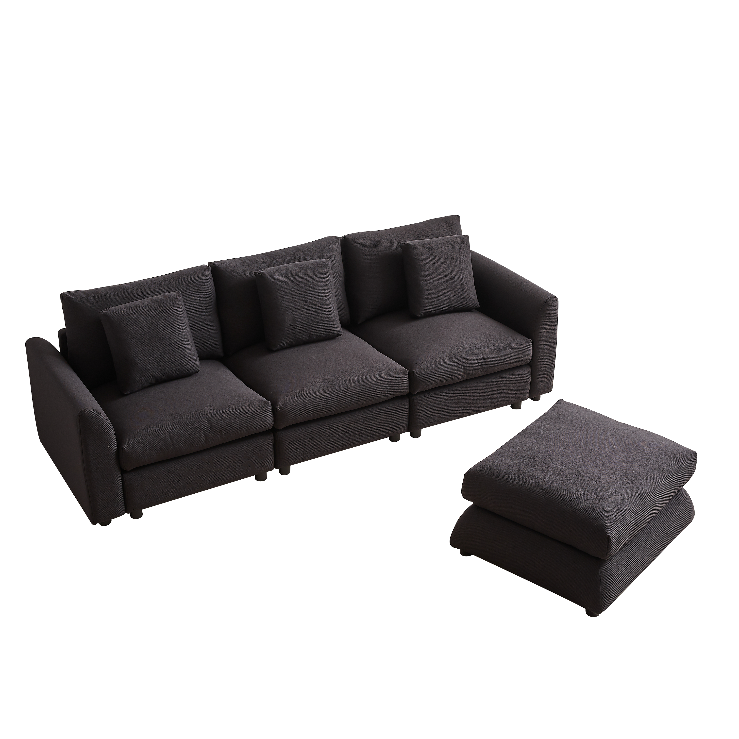 Dark modular sofa with separate ottoman, arranged in a customizable L-shape with 3 cushions and 4 pillows, ideal for flexible seating solutions.