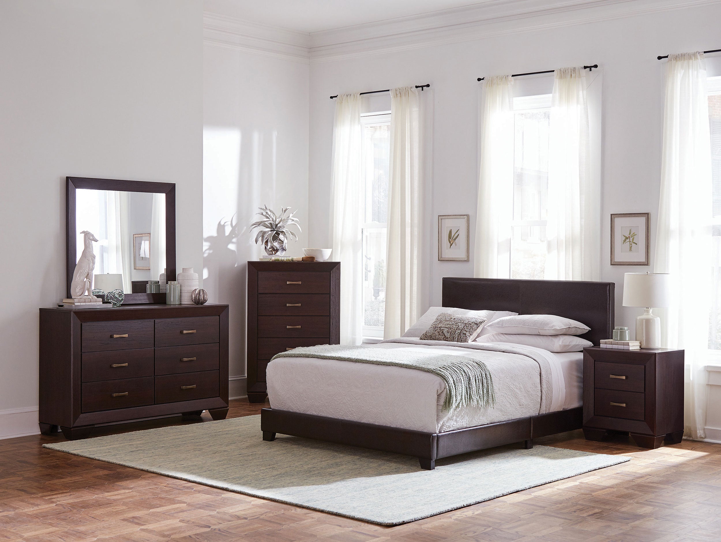 Dark cocoa Eastern king bedroom set with sleek, modern wood furniture including a dresser, mirror, chest, and nightstand.