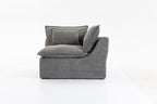 Side angle of the Cloud Couch modular sectional showing thick seat and back cushions in antique grey velvet.
