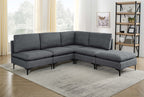 Dark gray linen modular sectional sofa featuring plush cushions and sleek black metal legs in a modern living room.