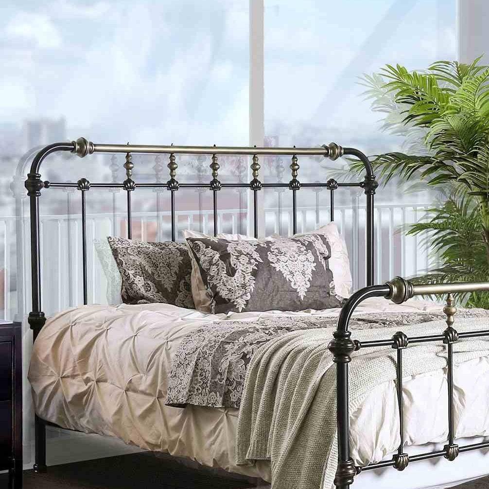 Antique Black King Size Bed with Gold Accents.