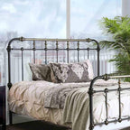 Antique Black Queen Size Bed with Gold Accents.