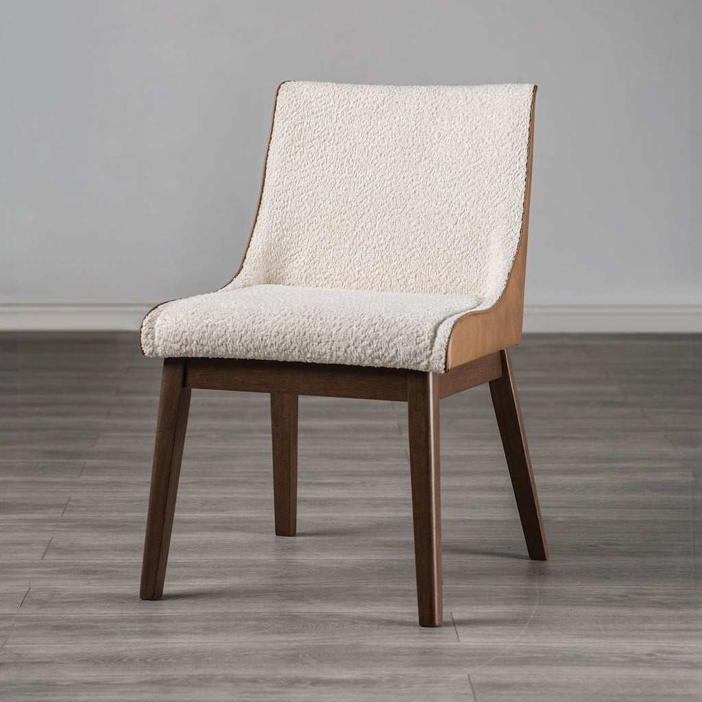Front angle of Mid-Century Modern Side Chair with padded seat and curved back, solid walnut wood legs for durable dining use.
