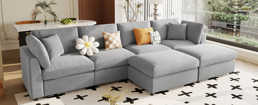 130' U-Shaped Sectional Sofa - Large & Versatile with ottomans placed in the center for a chaise-style configuration in a modern home.