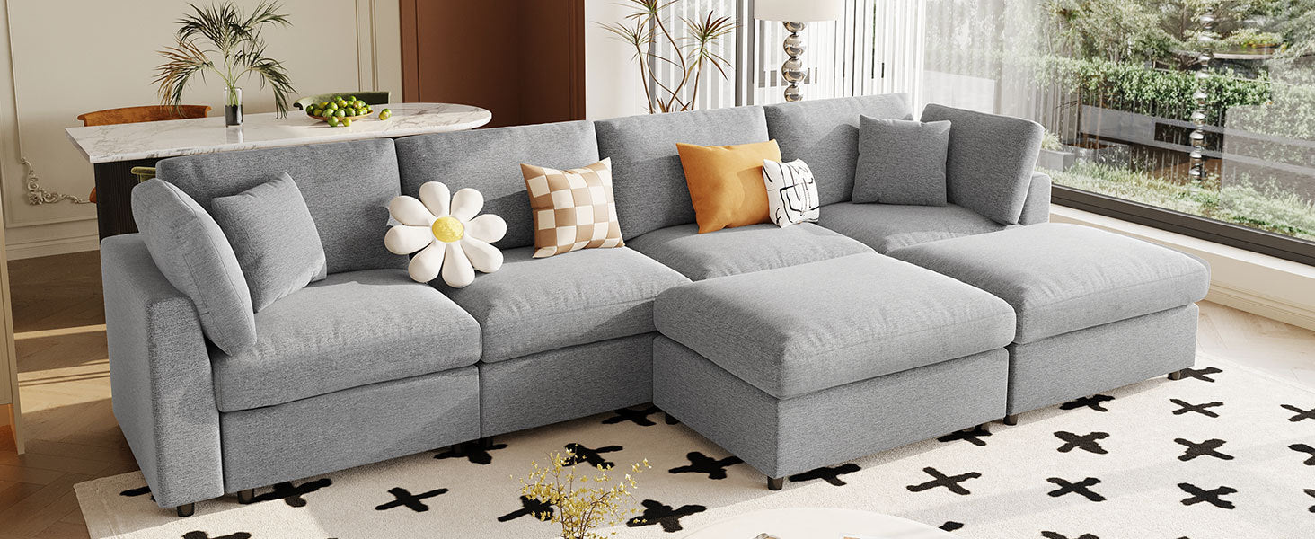 130' U-Shaped Sectional Sofa - Large & Versatile with ottomans placed in the center for a chaise-style configuration in a modern home.