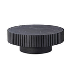 Studio image of the 35.43'' modern round coffee table with black sintered stone top and fluted cylindrical base.