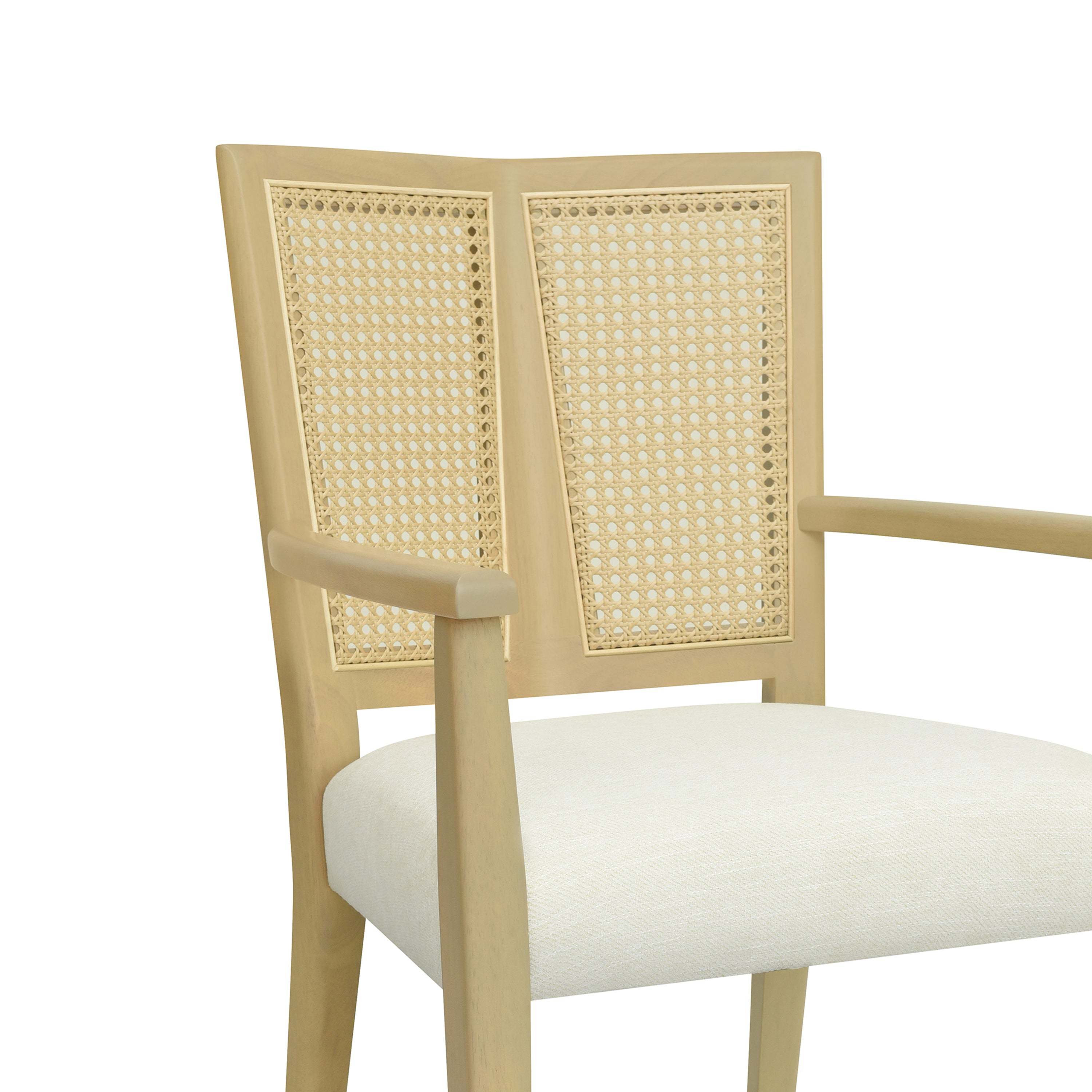 Close-up of rattan backrest and armrest design on mid-century modern dining chair, emphasizing craftsmanship and natural texture.