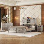 Antique gray farmhouse bedroom set with sliding-door storage headboard, charging station, dresser, and nightstand.
