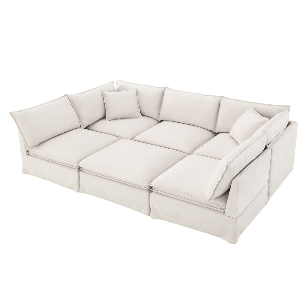 Modular sectional sofa with ottoman converted into a spacious sofa bed, perfect for overnight guests and lounging.