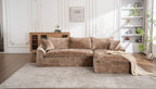 Large, modern brown textured fabric L-shaped sectional sofa with deep, plush cushions and a side chaise.