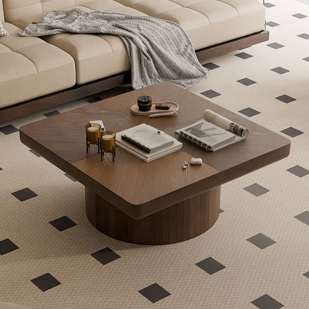 Close-up of walnut square coffee table showcasing parquet wood veneer top and thickened edges, styled with decor items.