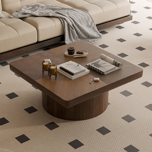 Close-up of walnut square coffee table showcasing parquet wood veneer top and thickened edges, styled with decor items.