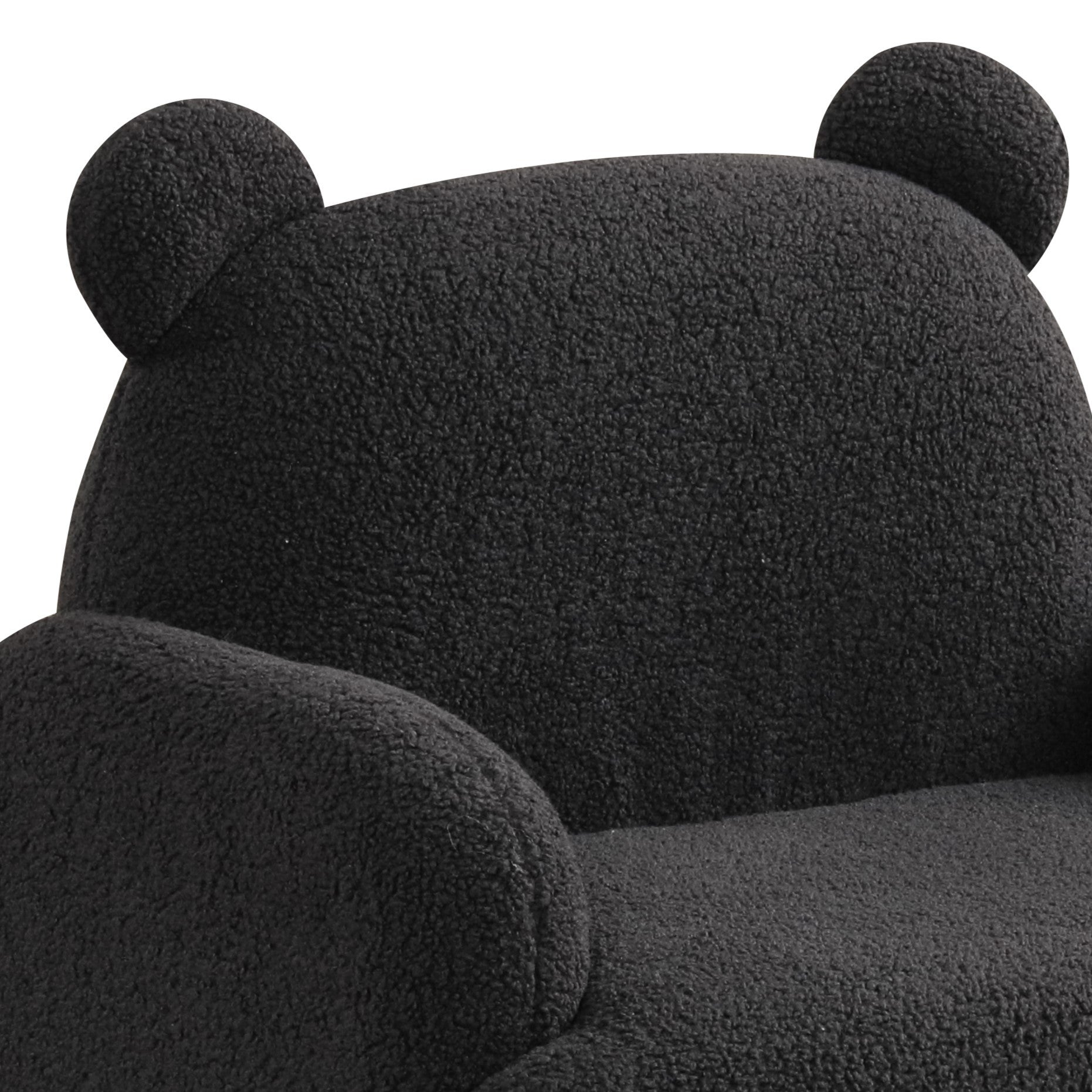 Close-up of Black Sherpa Kids Armchair showing bear-shaped backrest with soft, rounded ears and cozy sherpa texture for added charm.