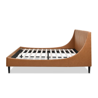 Side profile of Aspen king platform bed in caramel tan faux leather, showing curved headboard and slatted base design.