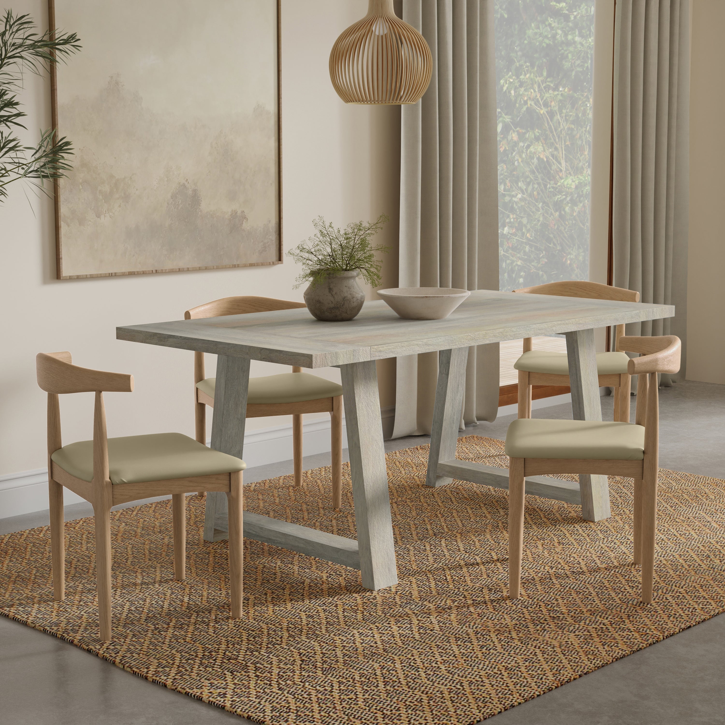 Whitley Dining Table in solid mango wood shown in a modern dining room with four chairs, highlighting its elegant and durable design.