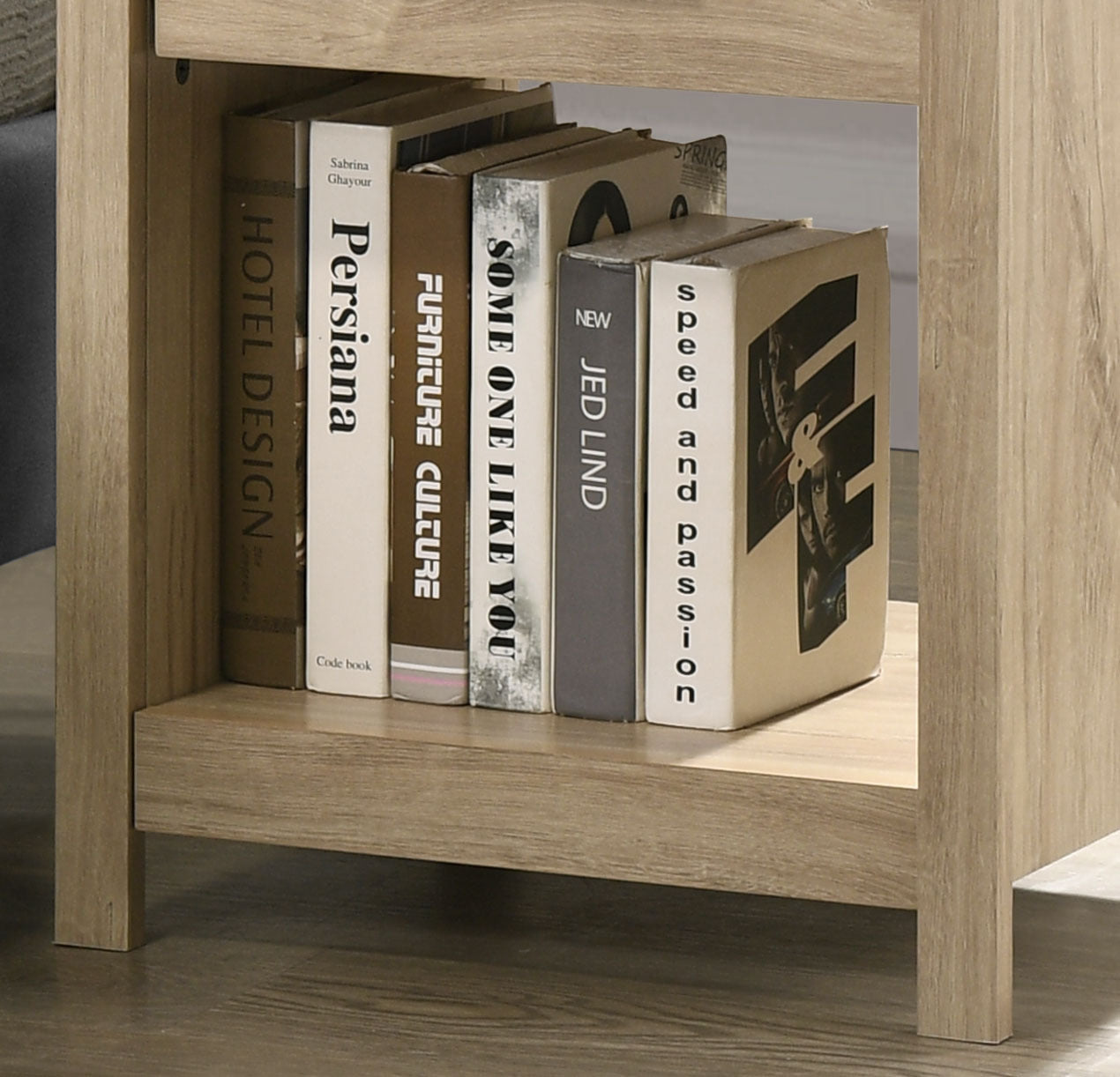 Open shelf of Light Oak Nightstand with Drawer - Celeste 20' filled with books. Perfect for displaying decor or storing reading materials.