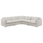 Modern ivory 5-piece modular sectional sofa with slim track arms, feather-filled cushions, and a white fabric finish.