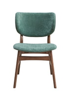 Front view of green upholstered dining chair with walnut legs, offering modern comfort and design in the walnut dining set.