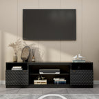 Modern black media console with textured geometric cabinet doors, open shelving, and surface space for large TVs.