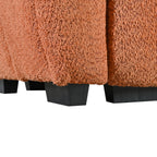 Close-up of boucle fabric texture and black plastic legs on the modular sectional sofa with ottoman, emphasizing durability and style.