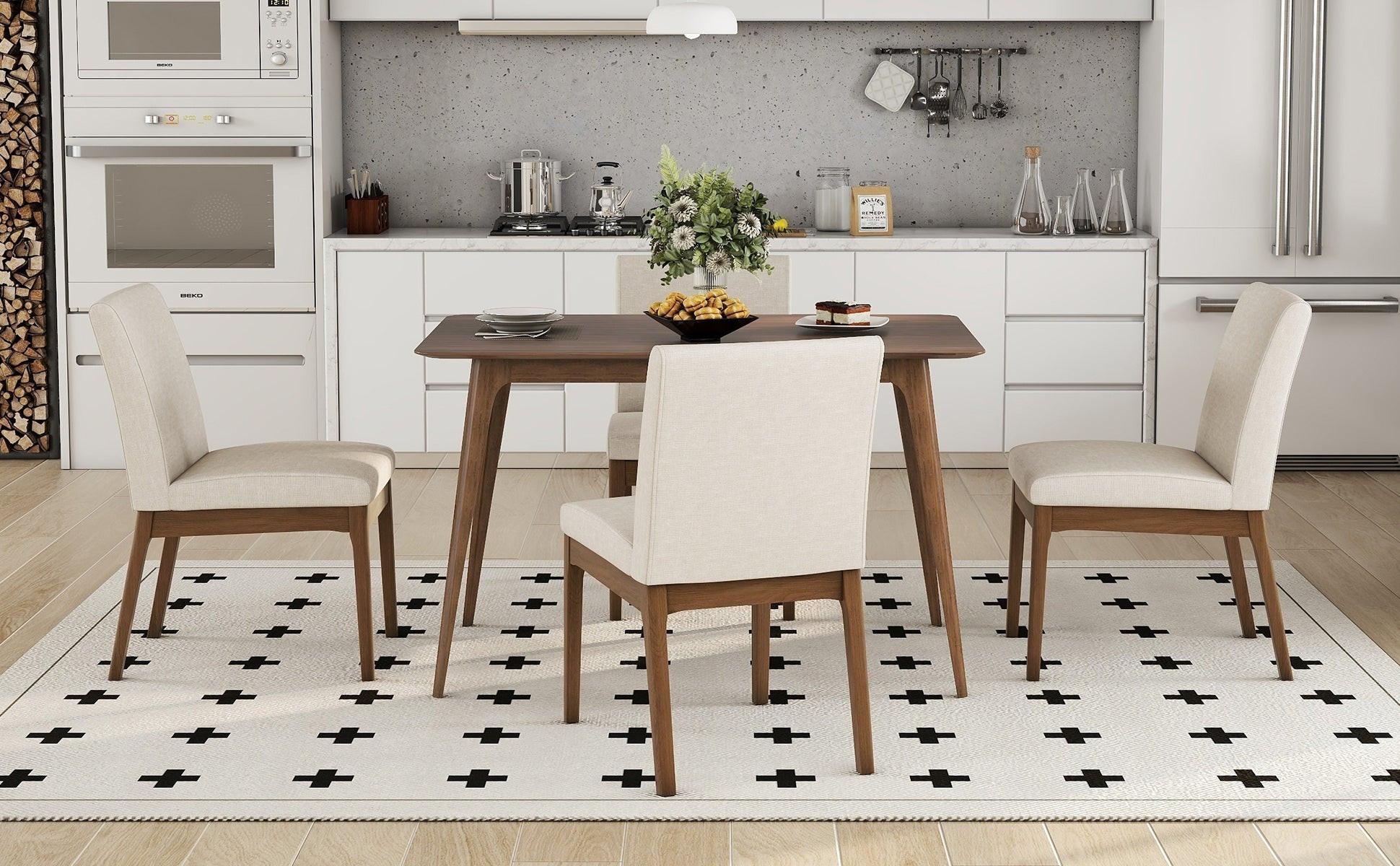 Mid-Century Modern Dining Set with solid rubberwood table and four upholstered chairs in a white kitchen. Ideal for small families and modern spaces.