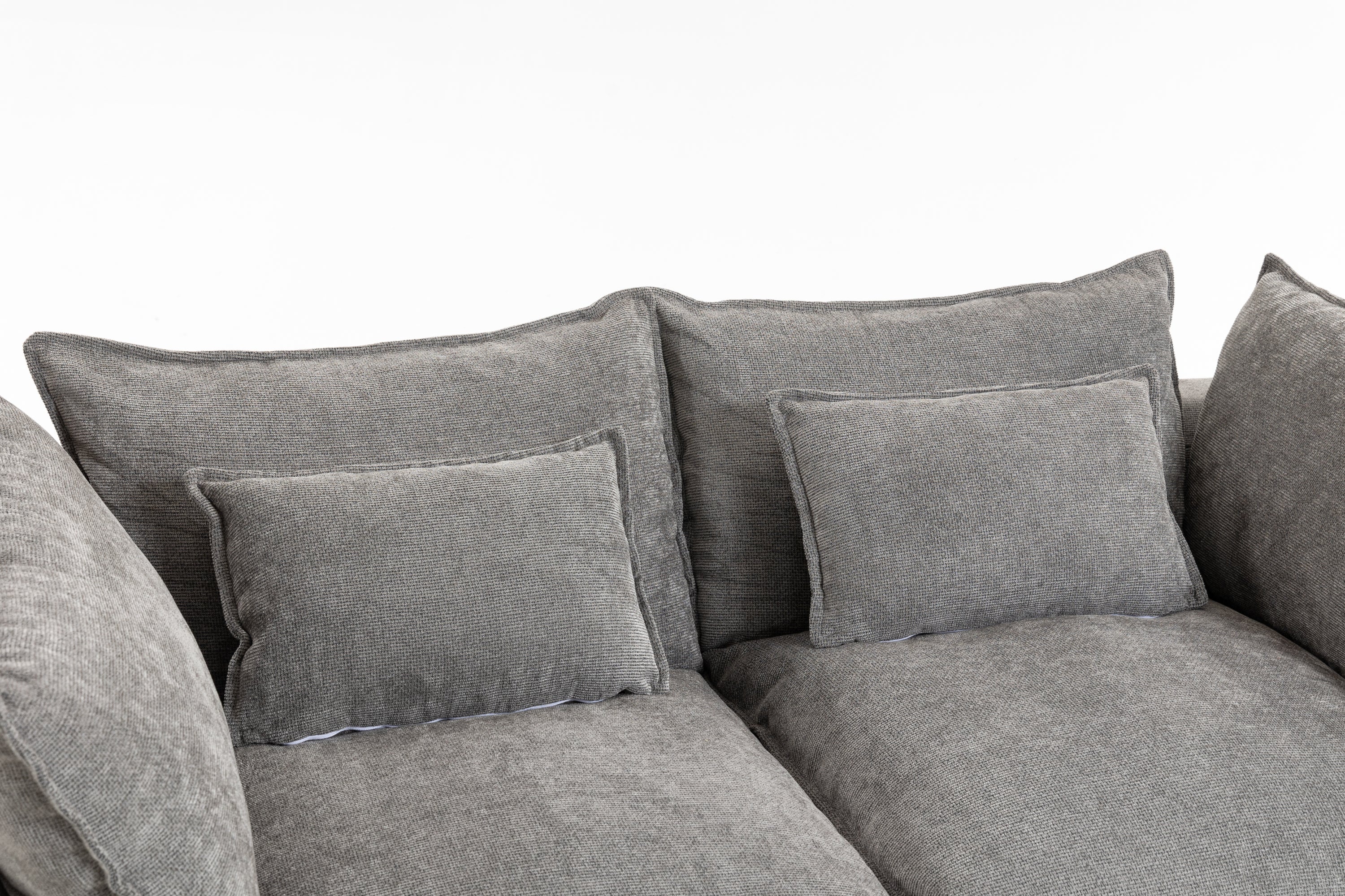 Top view of the Cloud Couch showing two large seat cushions and four plush back pillows in soft grey velvet.
